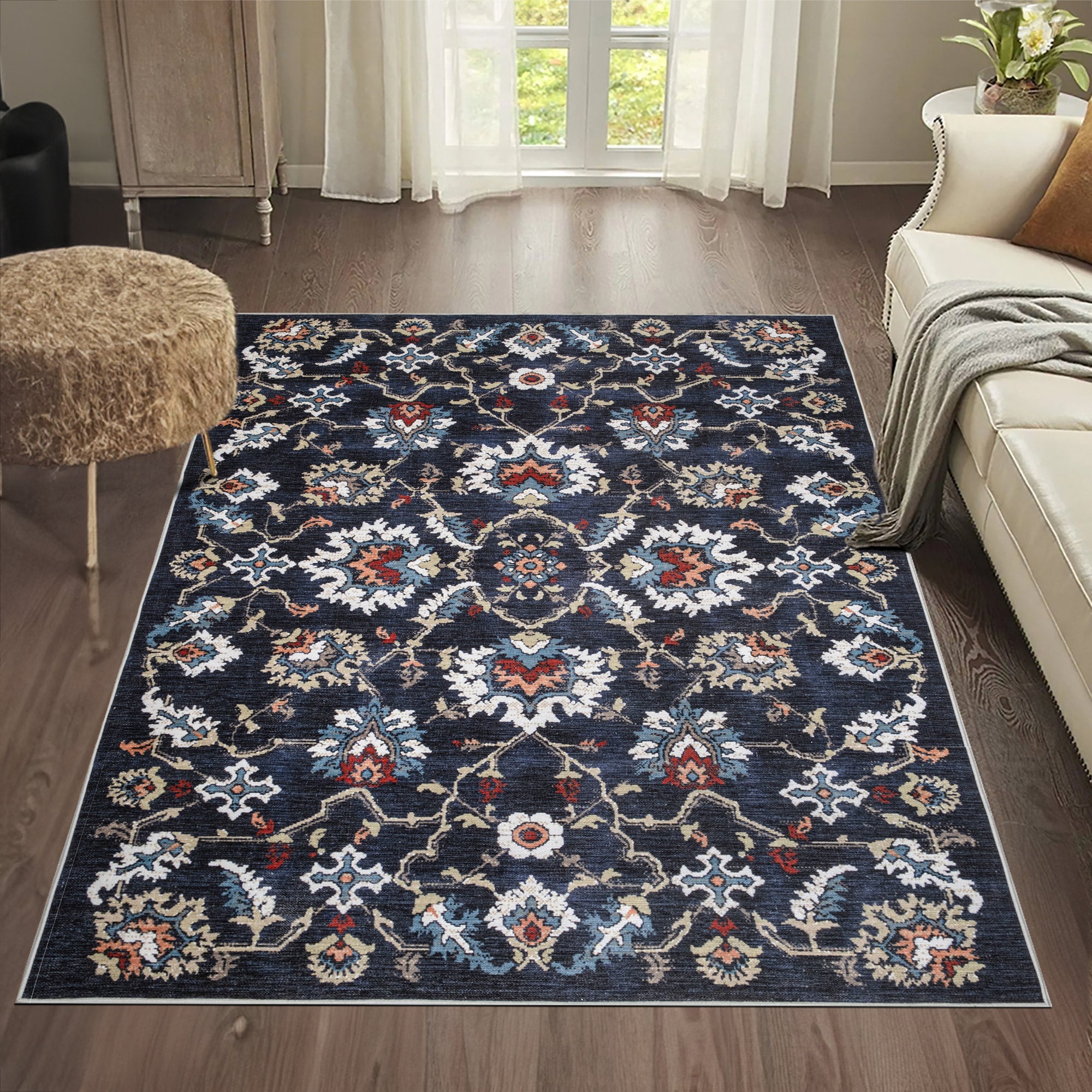 Navy Konya machine washable area rug 2' x 3' - styled in a room setting