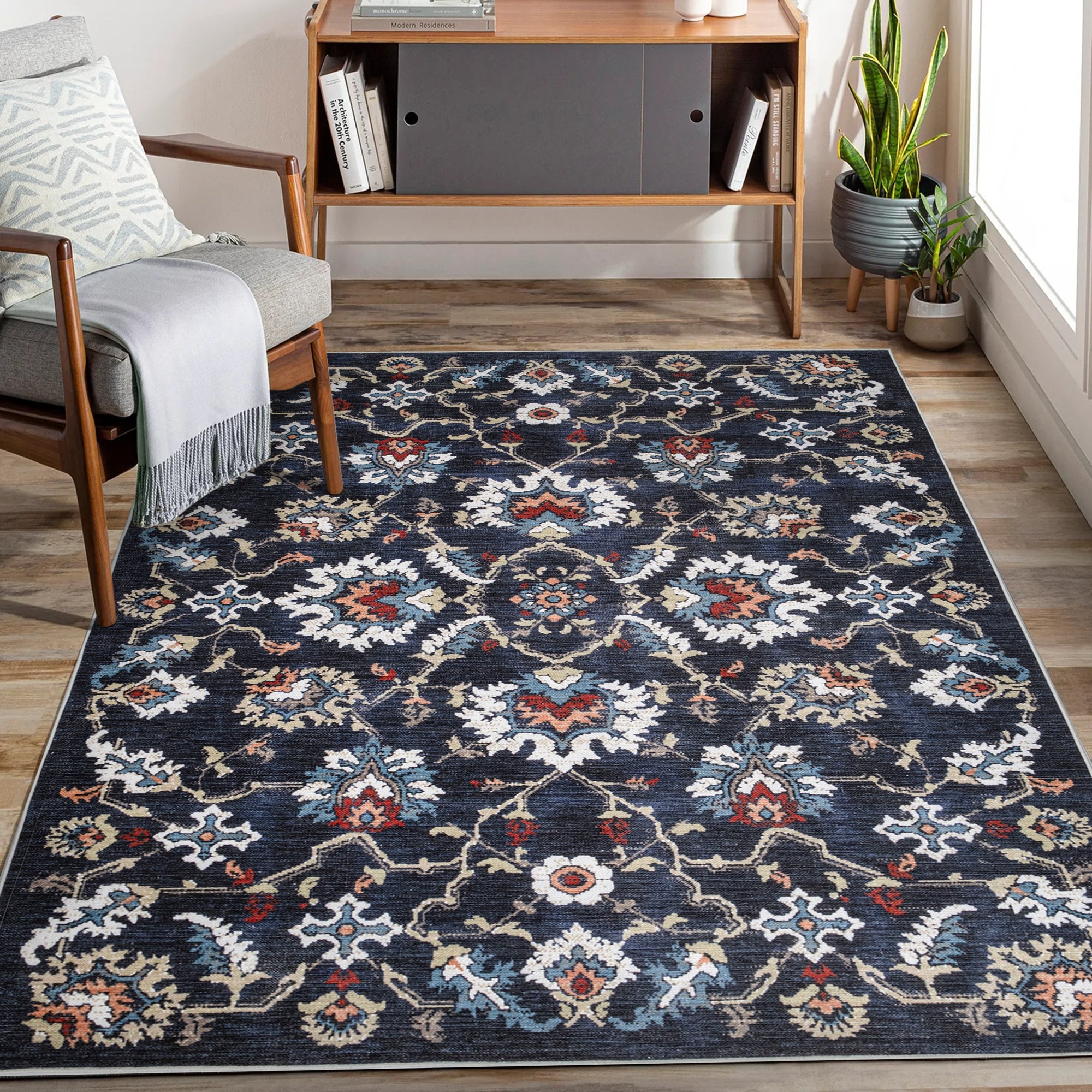 Navy Konya machine washable area rug 2' x 3' - styled in a living room