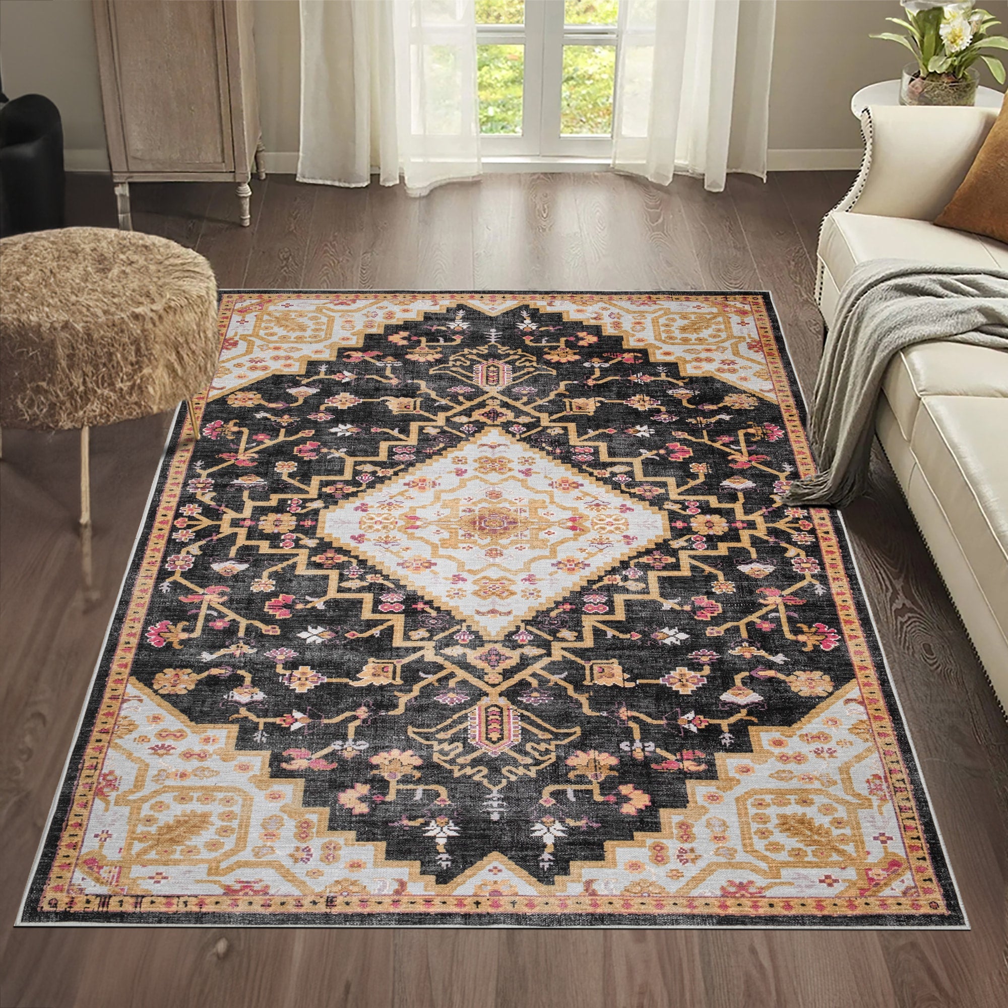 Charcoal Konya machine washable area rug 2' x 3' - styled in a room setting