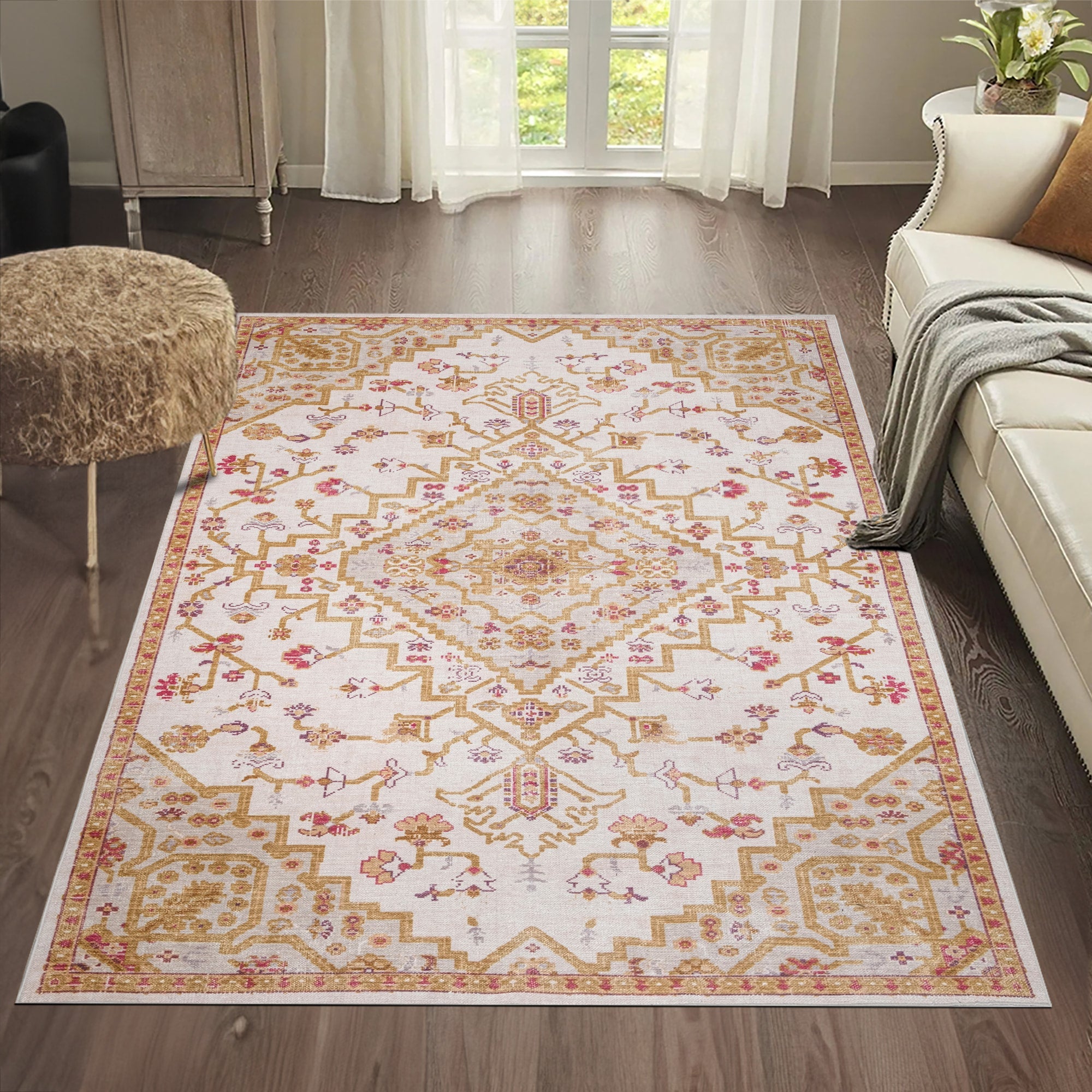 Ivory Konya machine washable area rug 4' x 6' - styled in a room setting