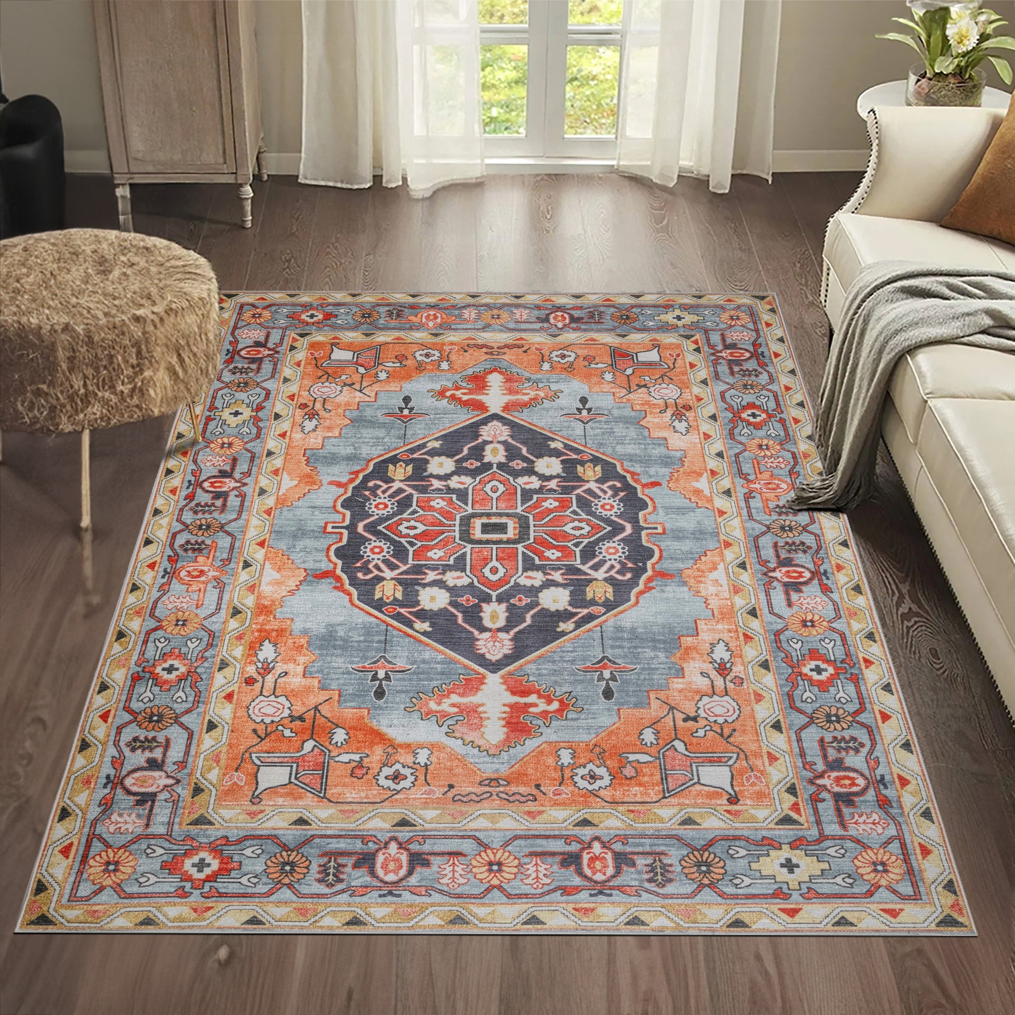 Orange Konya machine washable area rug 4' x 6' - styled in a room setting