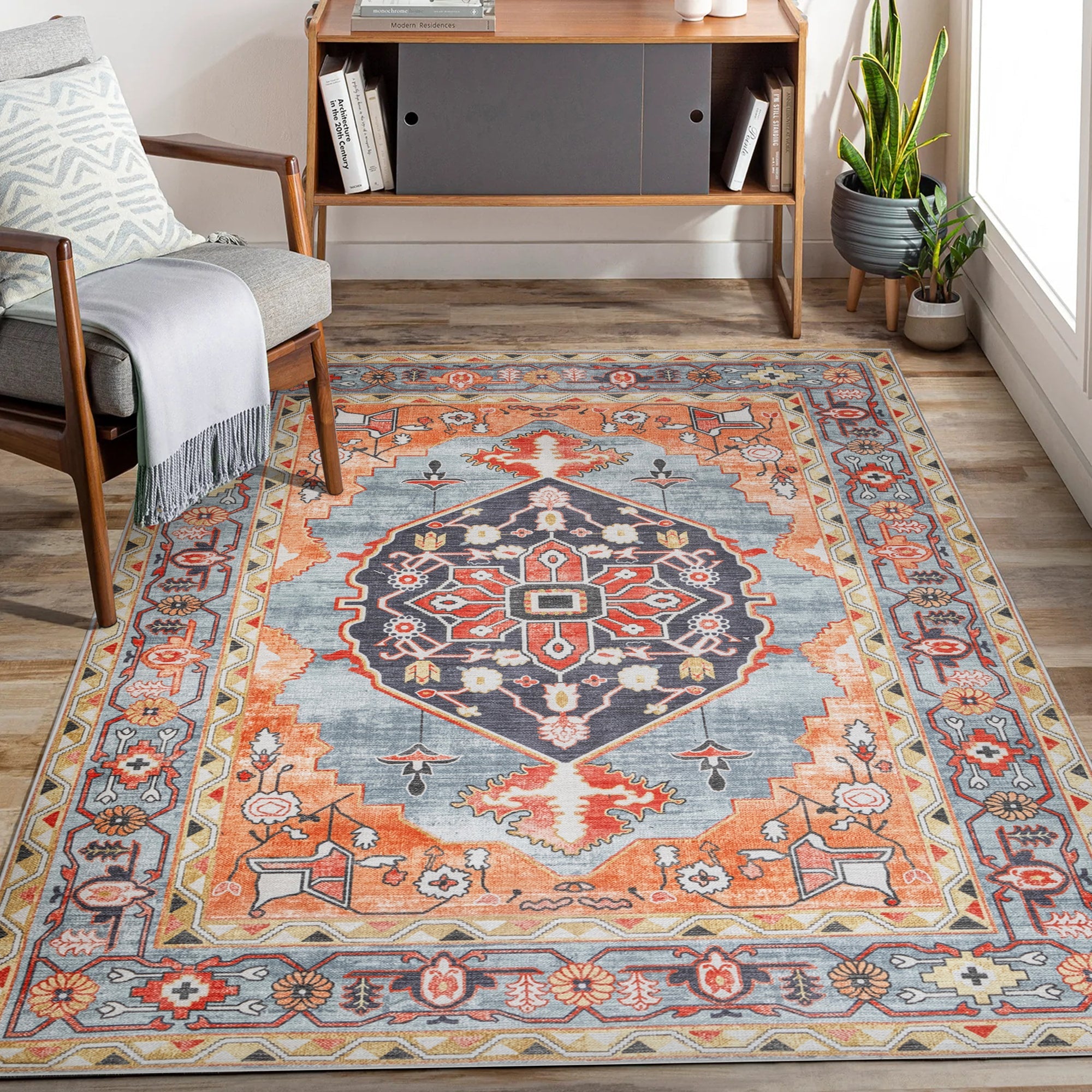 Orange Konya machine washable area rug 2' x 3' - styled in a living room