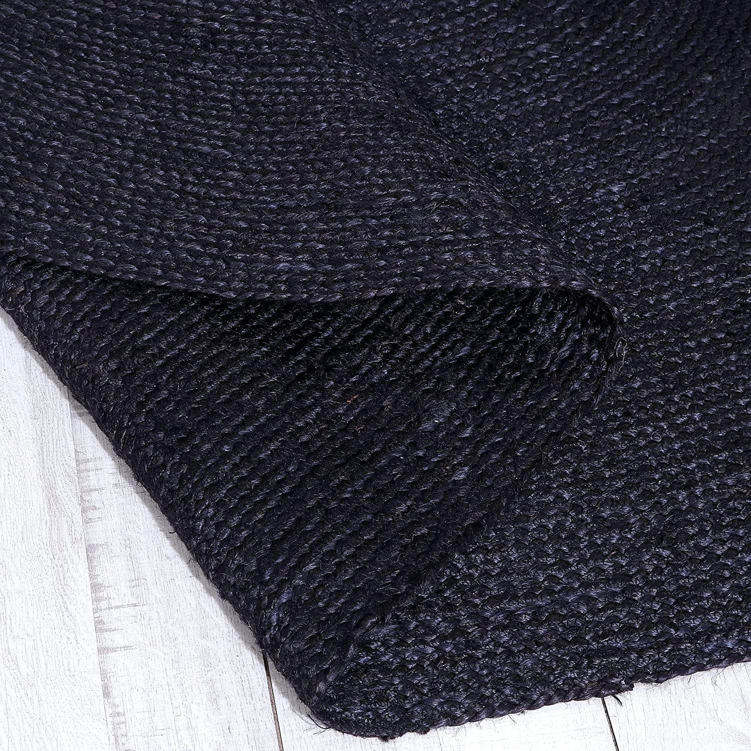 Eco-Friendly Black Jute Braided Area Rug in Black #color_black