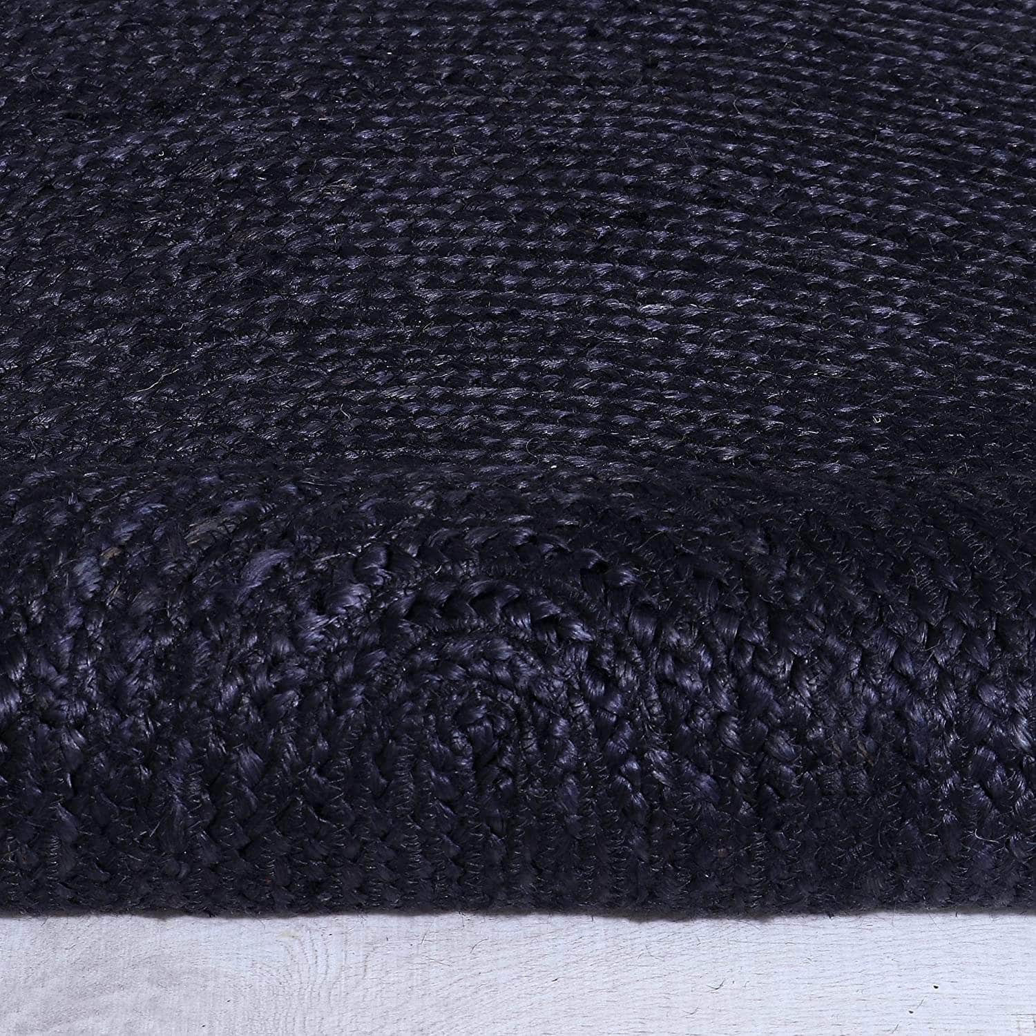 Eco-Friendly Black Jute Braided Area Rug in Black #color_black